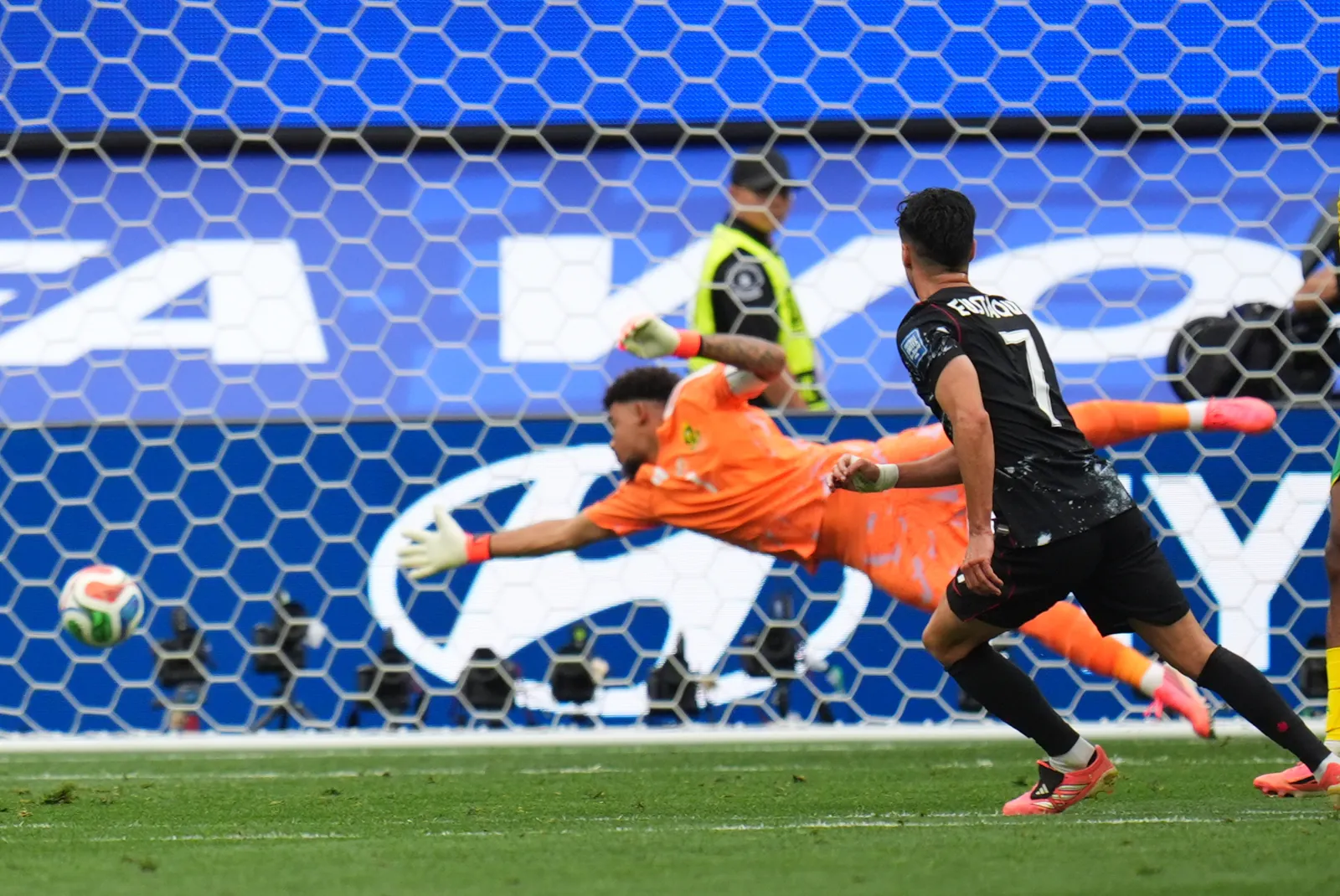 Canada's Stephen Eustaquio scores during the World Cup round of 32 soccer match between South Africa and Canada