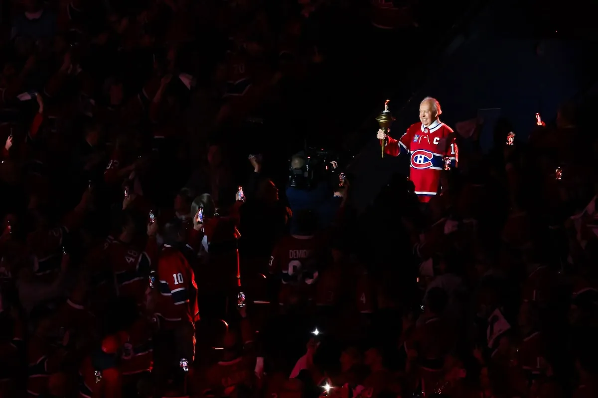Montreal Canadiens alumnus Yvan Cournoyer carries the team's flaming torch before a home playoff game at the Bell Centre in April.Minas Panagiotakis/Getty Images