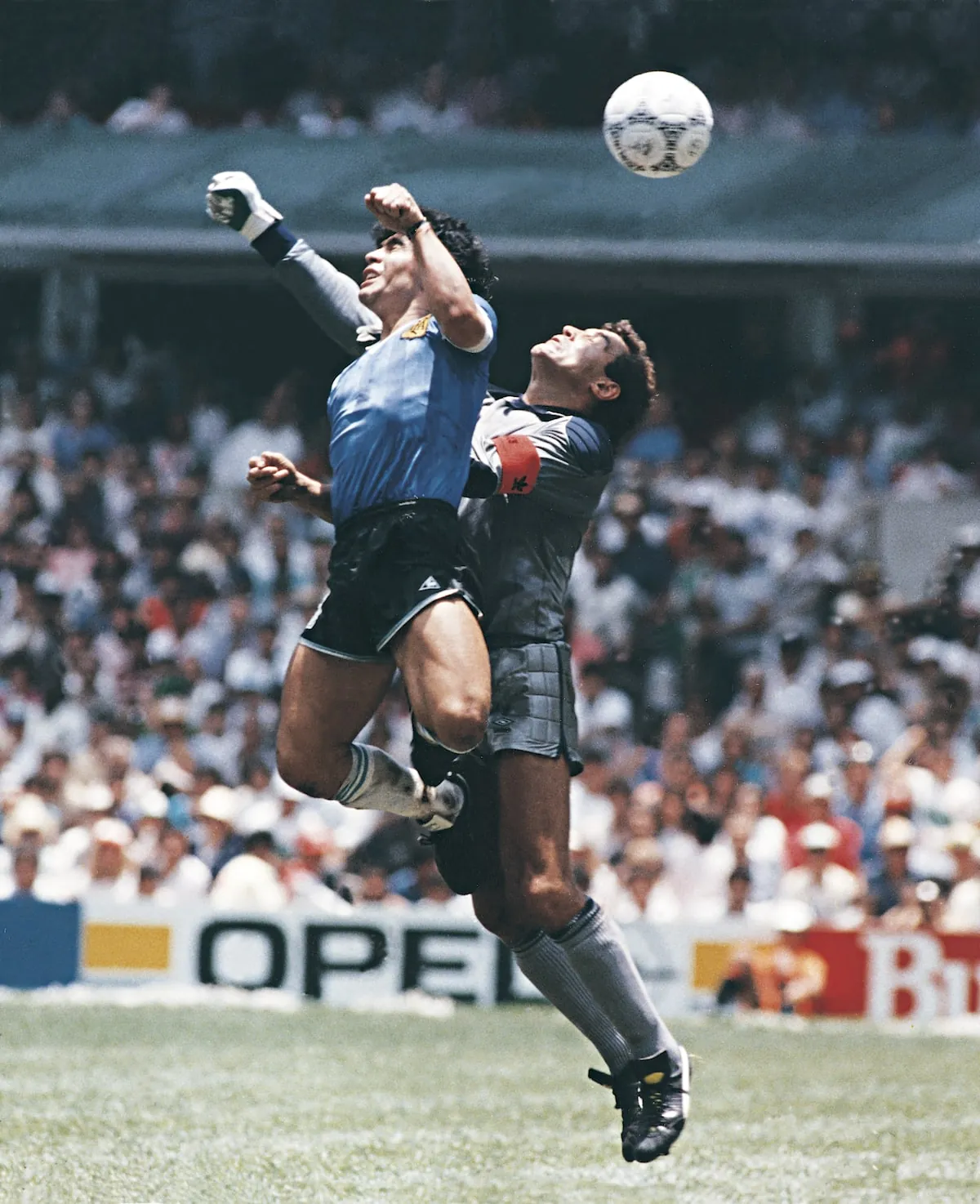 Diego Maradona uses his hand to score the opening goal of Argentina's quarter-final win over England.El Grafico/Getty Images