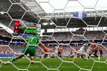 Jude Bellingham pounces on an error to score England’s winning goal against Norway.