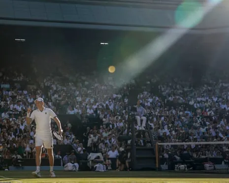Jannik Sinner pumps his fist after hitting a winner against Alexander Zverev.