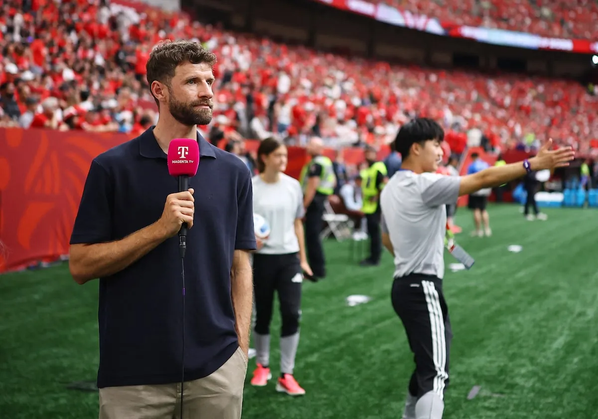 TV Pundit and former player Thomas Muller stands on the sidelines at BC Place in Vancouver before a World Cup match.Agustin Marcarian